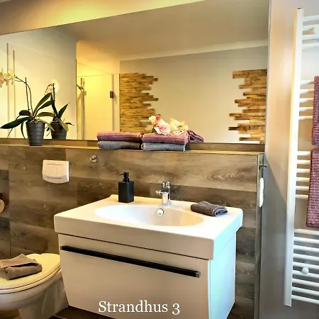 Апартаменты Im Strandhus Кюлунгсборн